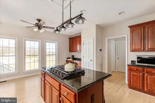 a large white bed in a white room
