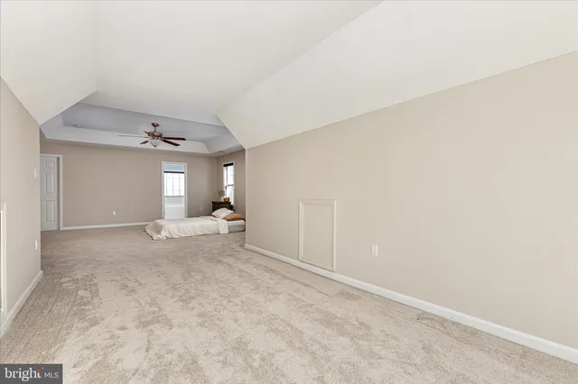 a kitchen with stainless steel appliances granite countertop a stove and a refrigerator