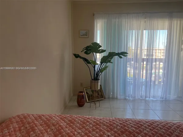 a vase of flowers sitting on a table
