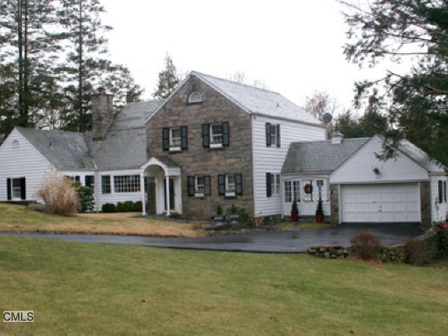514 Hunting Ridge Road Stamford, CT 06903 - Photo 1 of 1 a front view of a house with a garden