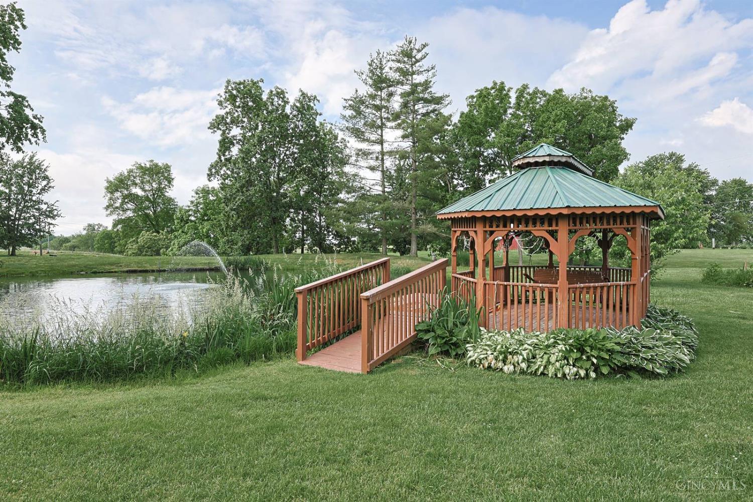 4617 Graybill Road Georgetown, OH 45121 - Photo 6 of 58 Beautifully Landscaped Waterfront Gazebo With Porch Swing