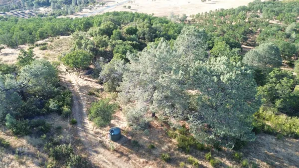 an aerial view of ocean with residential house and space