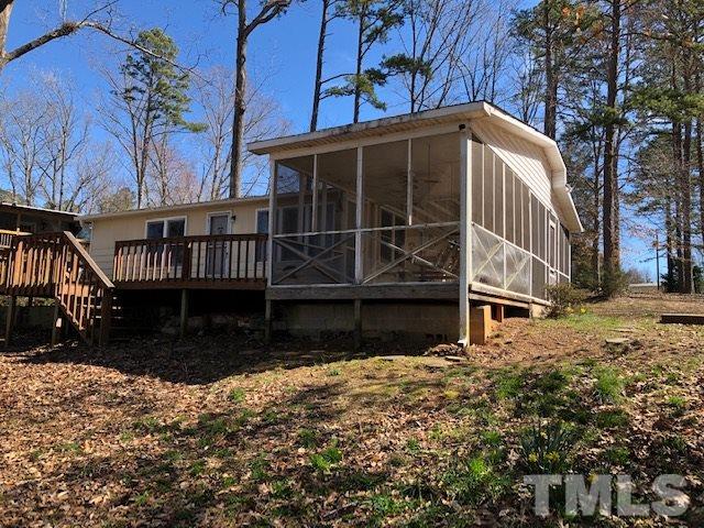 291 Kerr Lake Road Henderson, NC 27537 - Photo 5 of 15 a view of a house with a yard