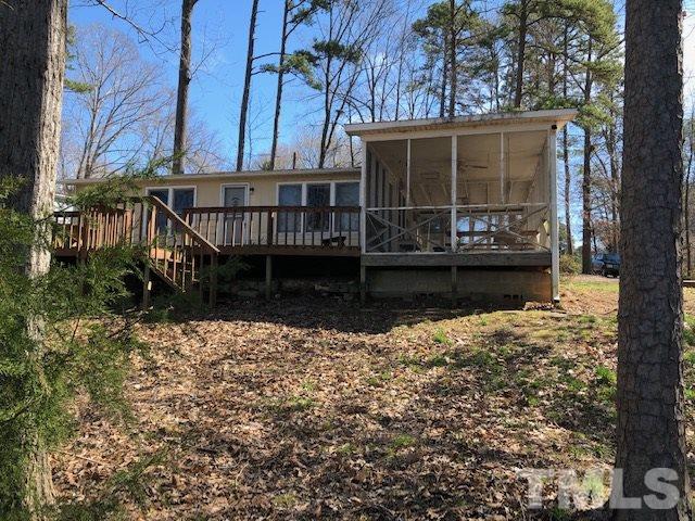 291 Kerr Lake Road Henderson, NC 27537 - Photo 6 of 15 a view of a house with a yard