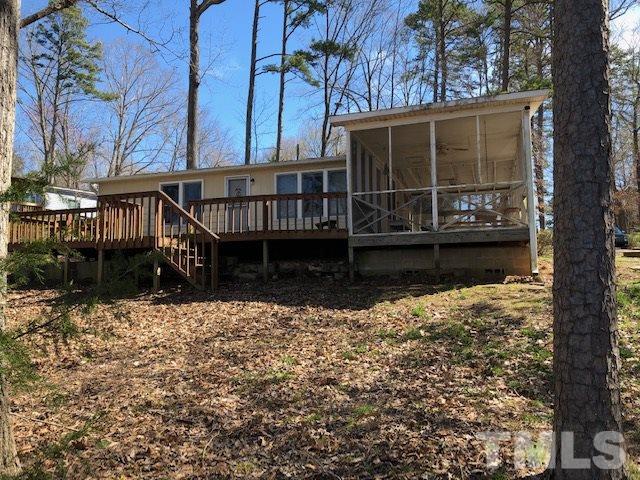 291 Kerr Lake Road Henderson, NC 27537 - Photo 7 of 15 a view of a house with a large window