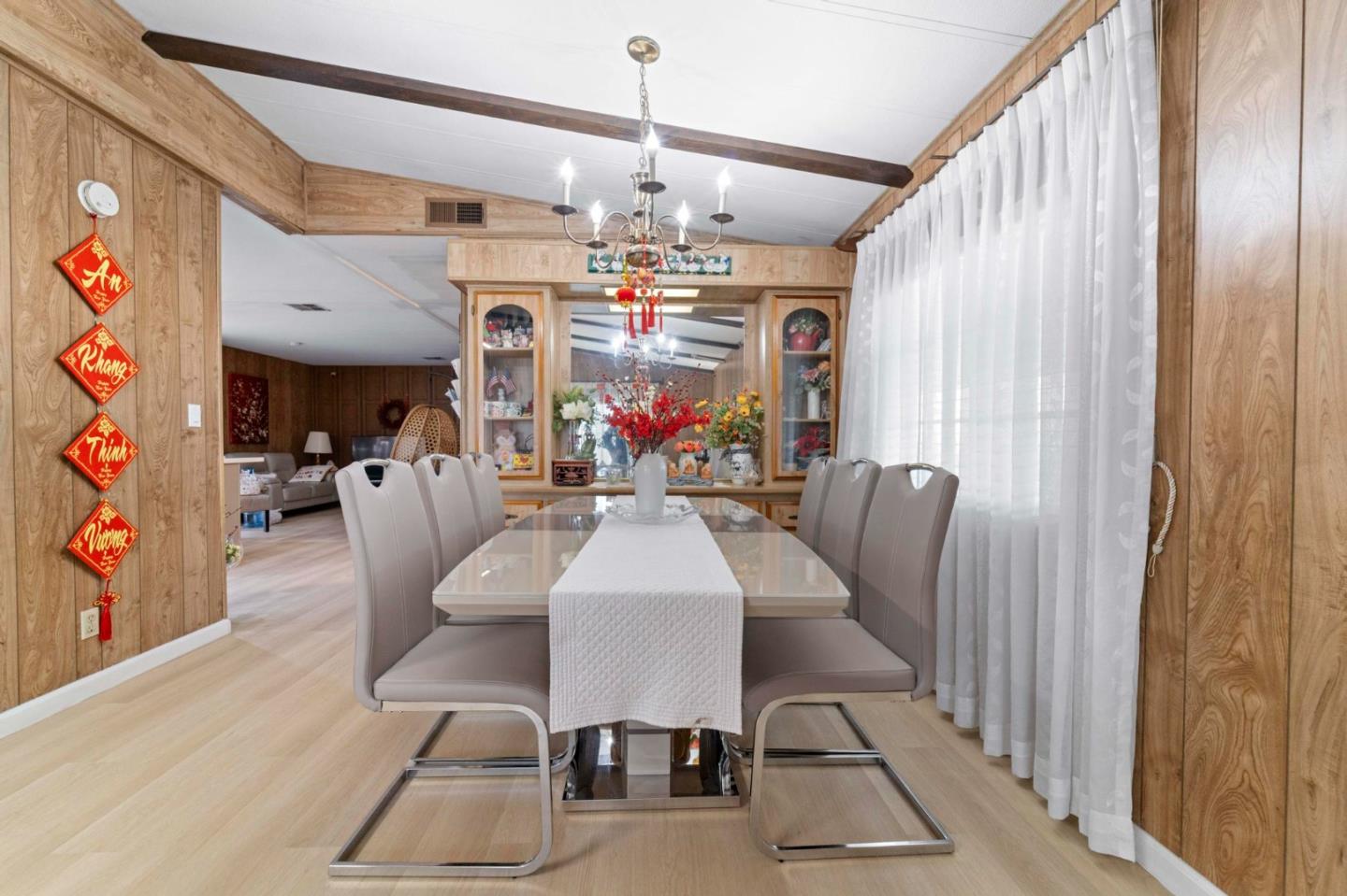 1872 Quimby Road, Unit 1872 San Jose, CA 95122 - Photo 11 of 36 a view of a dining room with furniture and chandelier