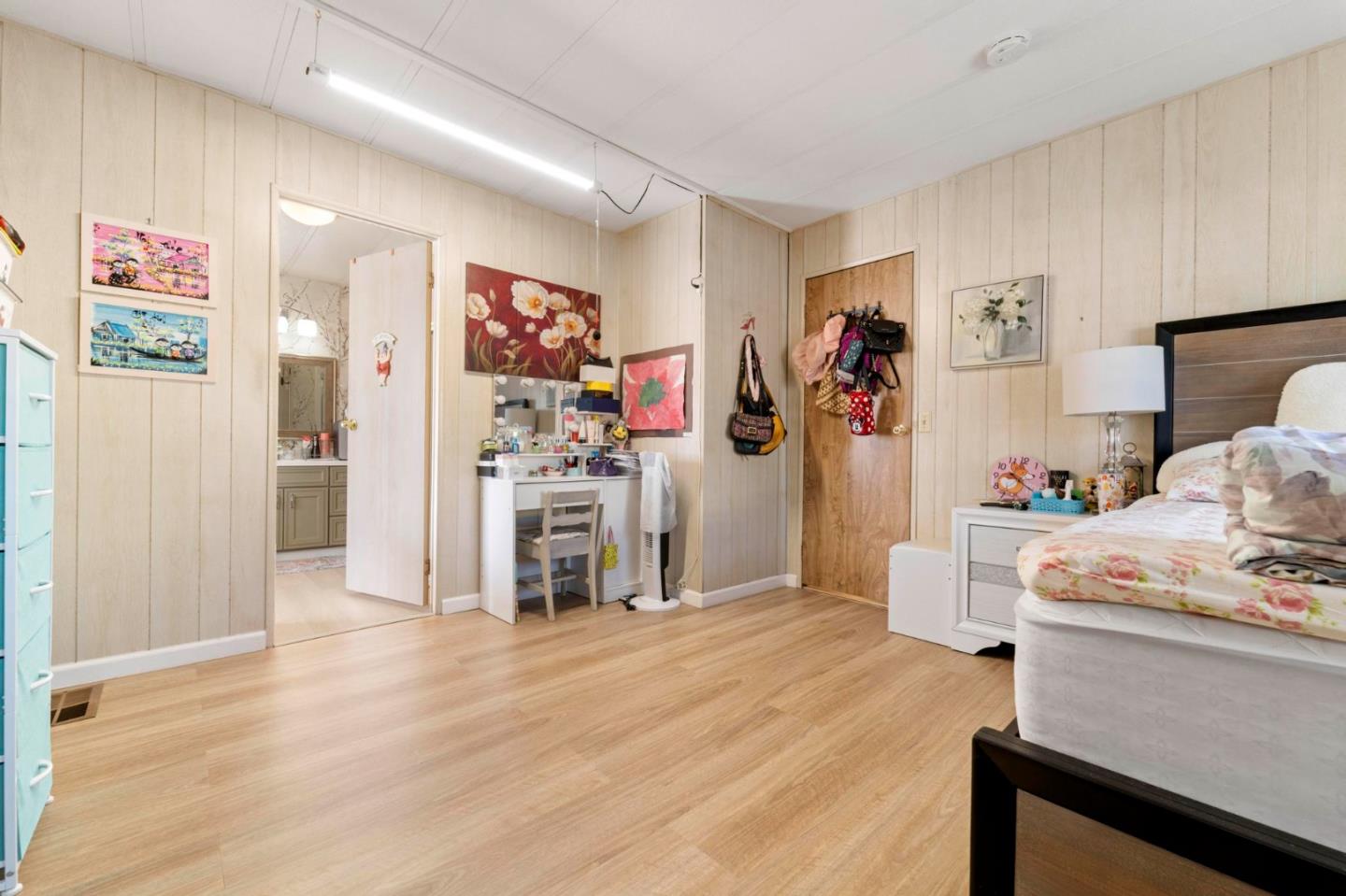 1872 Quimby Road, Unit 1872 San Jose, CA 95122 - Photo 19 of 36 a room with furniture and wooden floor