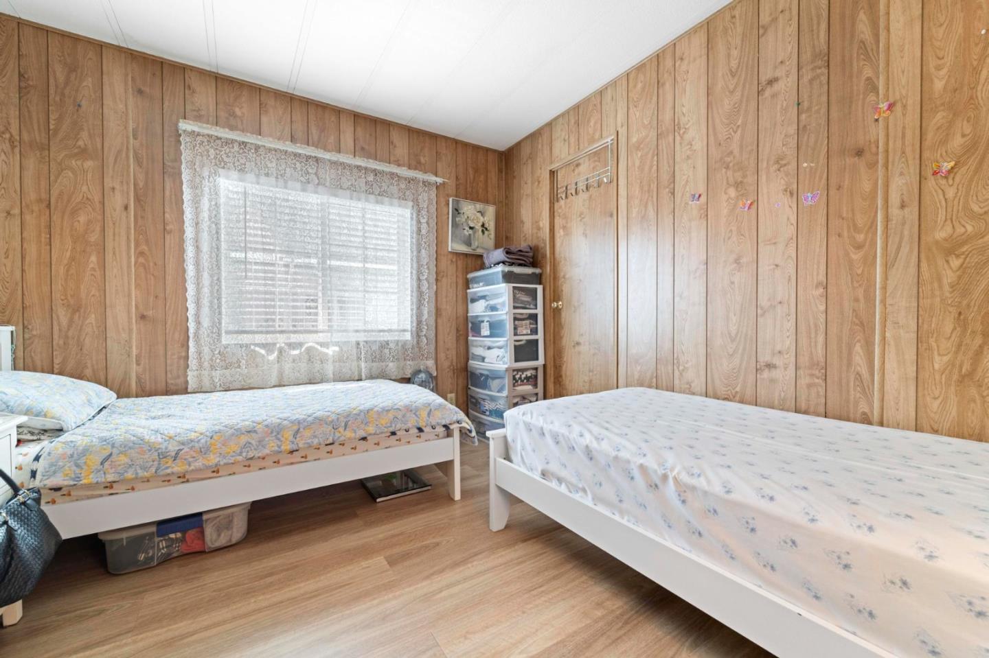 1872 Quimby Road, Unit 1872 San Jose, CA 95122 - Photo 22 of 36 a bedroom with a bed and a window