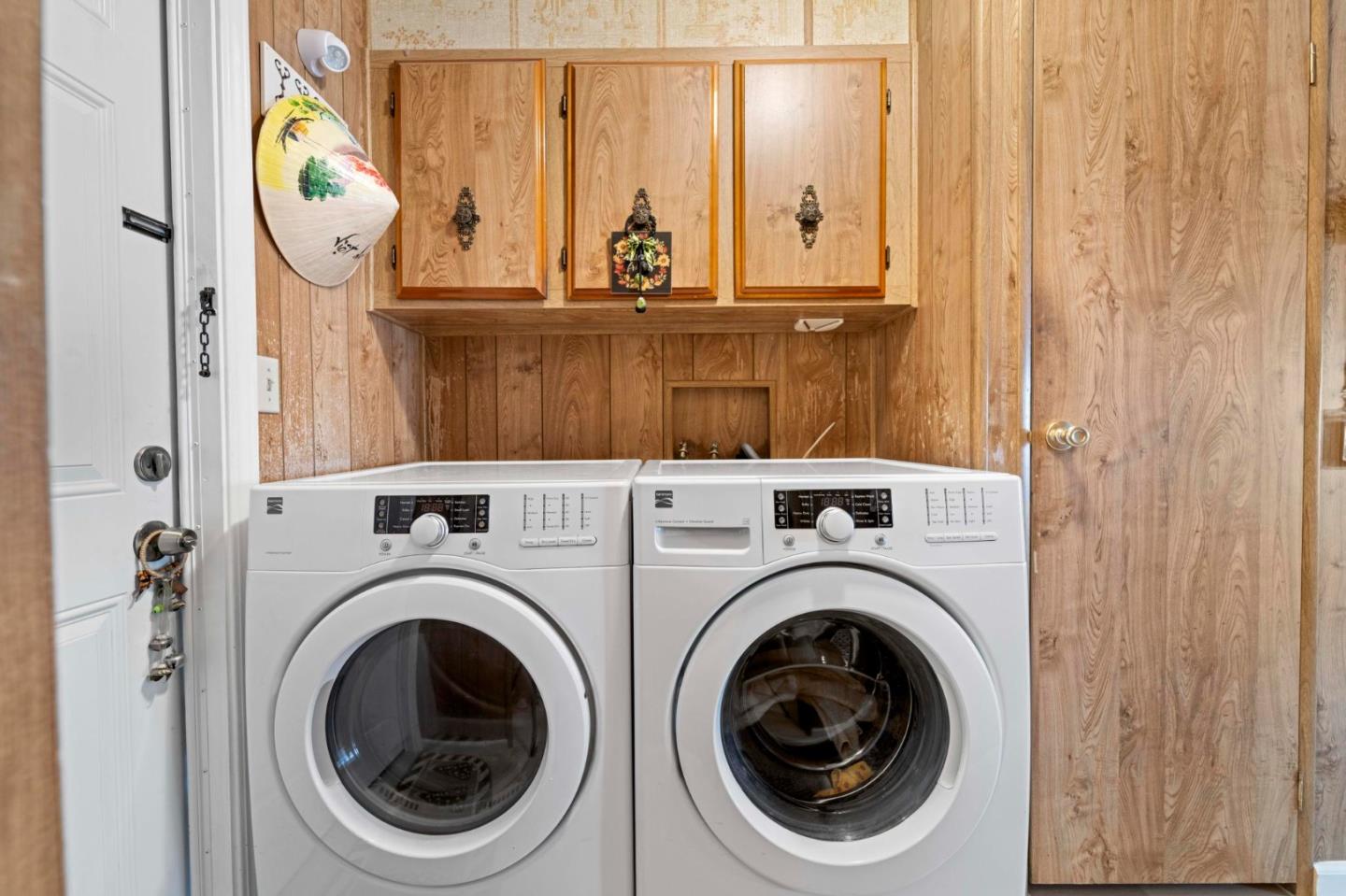 1872 Quimby Road, Unit 1872 San Jose, CA 95122 - Photo 25 of 36 a view of a hallway with washer and dryer