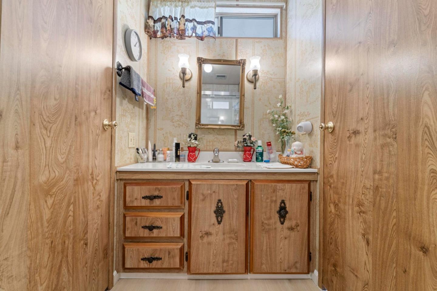 1872 Quimby Road, Unit 1872 San Jose, CA 95122 - Photo 26 of 36 a bathroom with a sink vanity and mirror