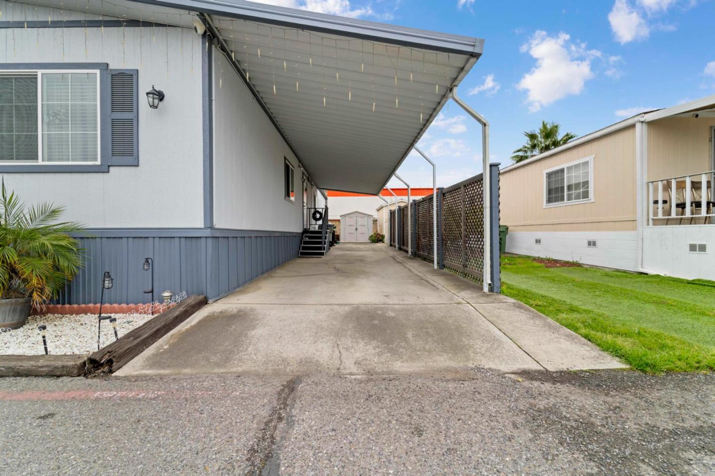 1872 Quimby Road, Unit 1872 San Jose, CA 95122 - Photo 35 of 36 a view of a house with backyard and a garage