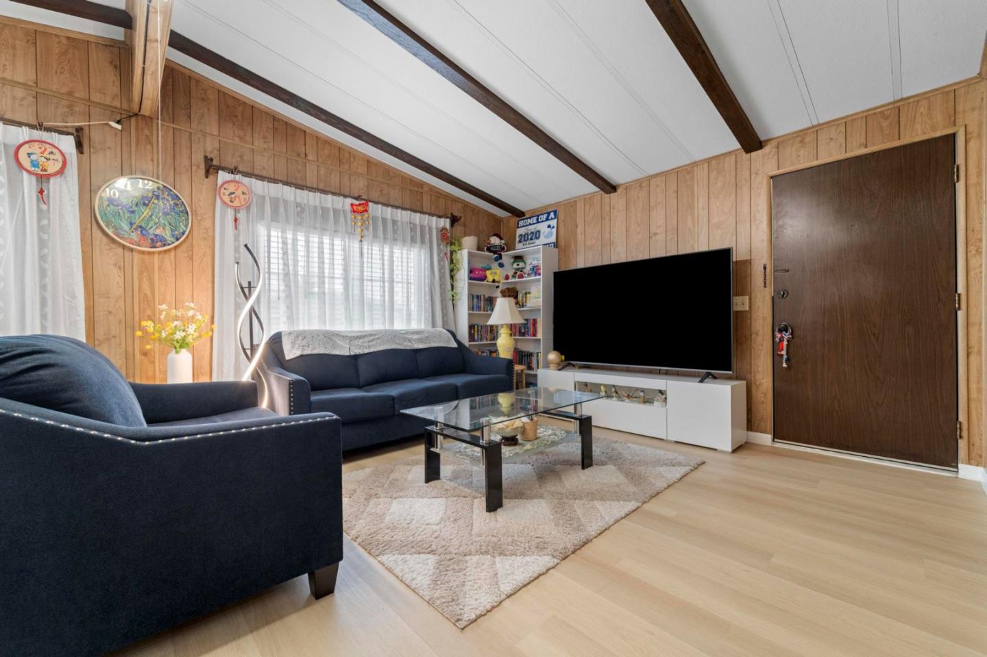 1872 Quimby Road, Unit 1872 San Jose, CA 95122 - Photo 6 of 36 a living room with furniture and a flat screen tv