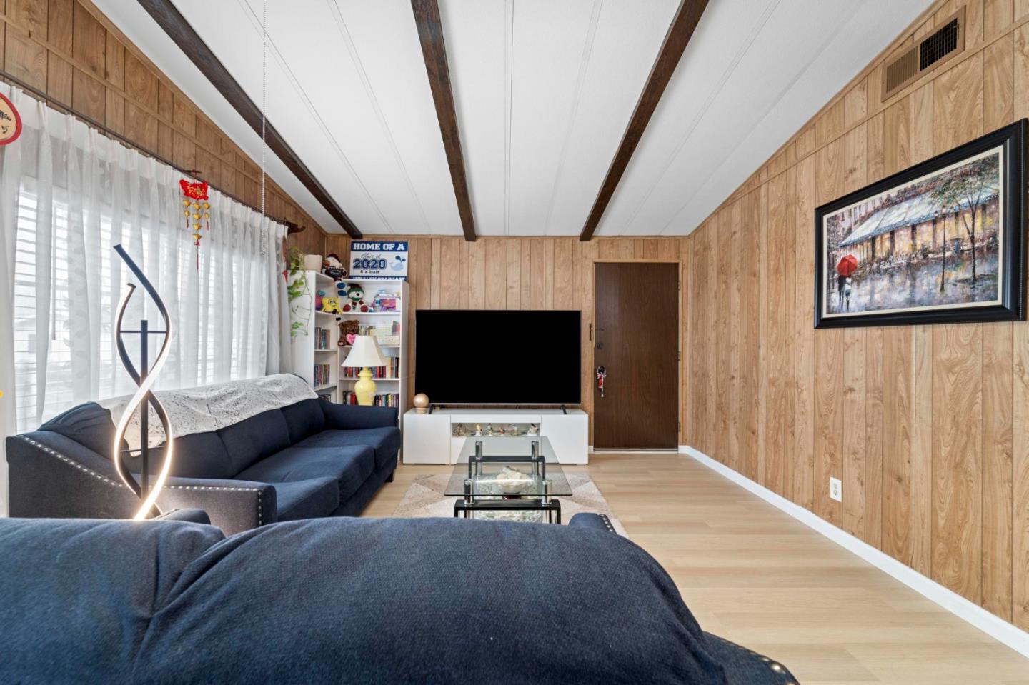 1872 Quimby Road, Unit 1872 San Jose, CA 95122 - Photo 7 of 36 a living room with furniture and a flat screen tv