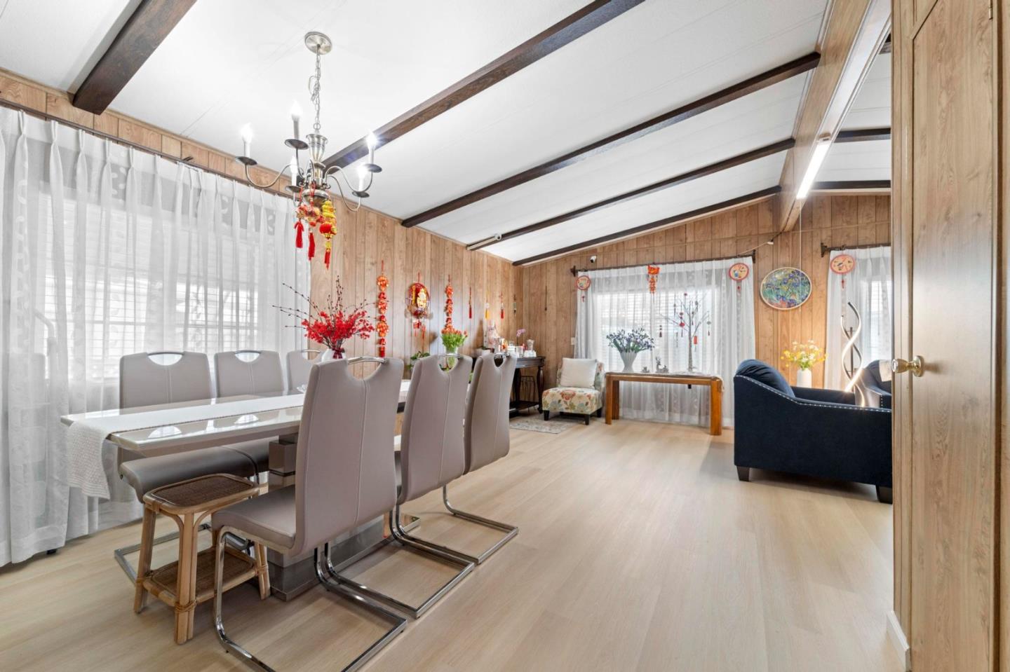 1872 Quimby Road, Unit 1872 San Jose, CA 95122 - Photo 9 of 36 a living room with furniture and a chandelier