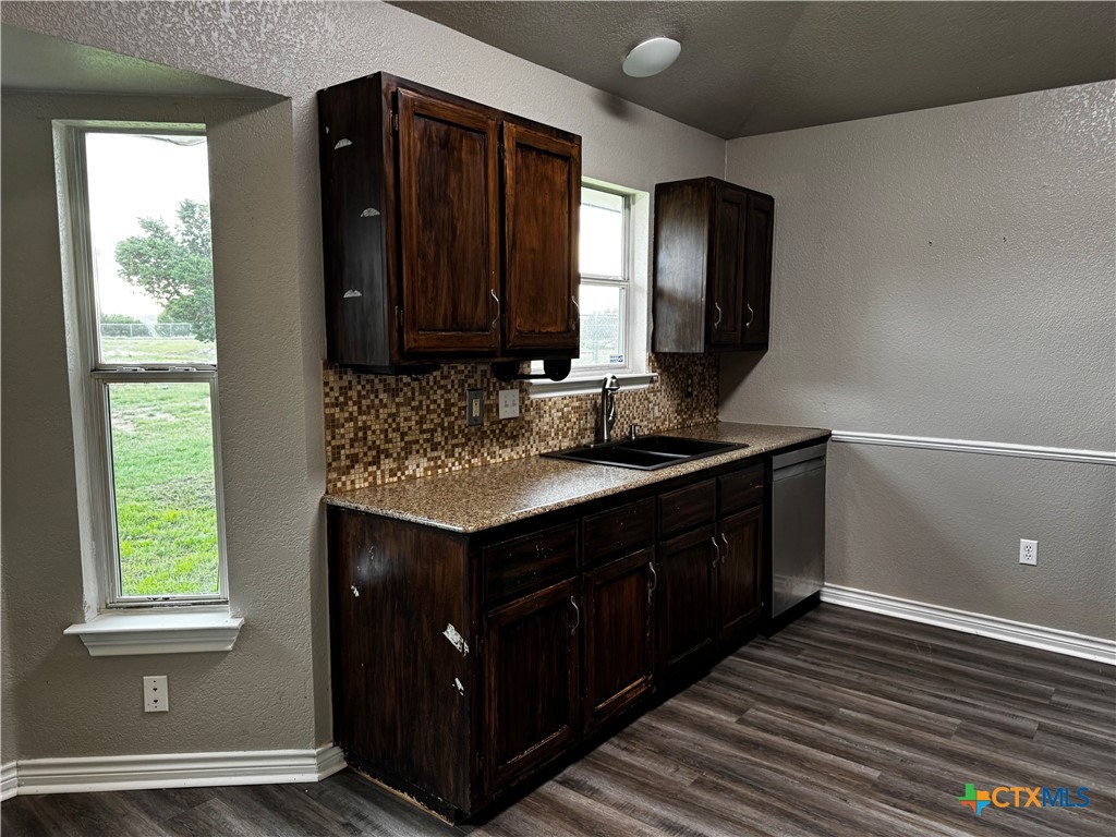 397 County Road 3367 Kempner, TX 76539 - Photo 14 of 47 a bathroom with a double vanity sink and a mirror