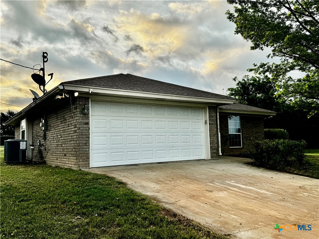 397 County Road 3367 Kempner, TX 76539 - Photo 2 of 47 a front view of a house with a yard