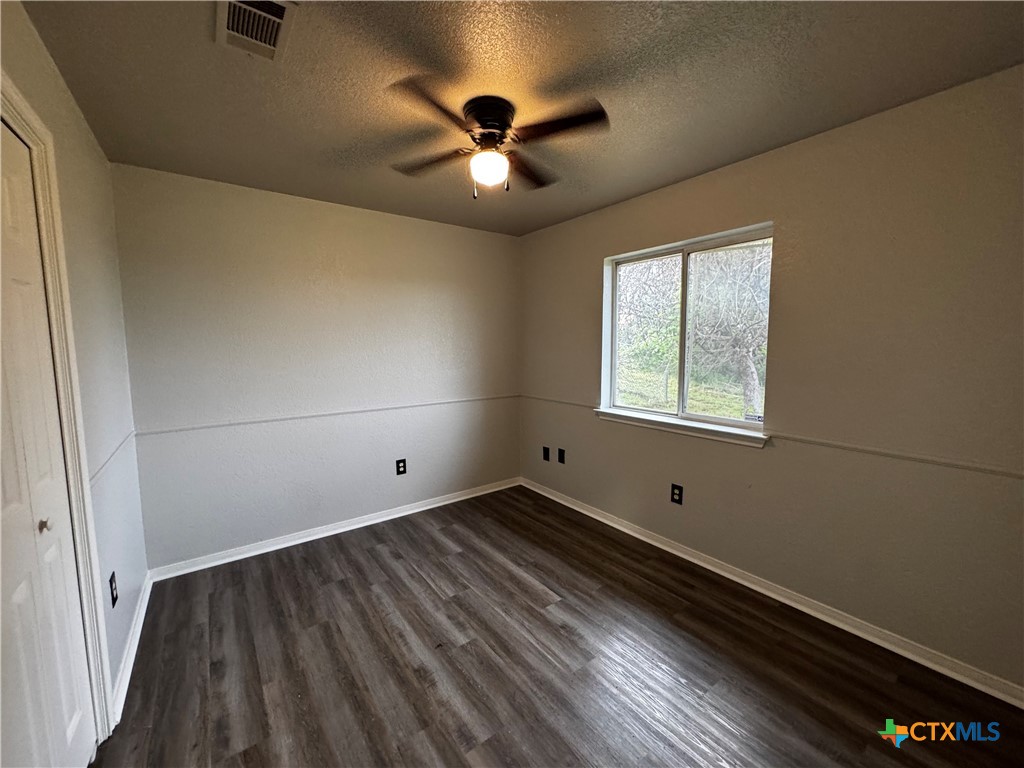 397 County Road 3367 Kempner, TX 76539 - Photo 27 of 47 a view of empty room with wooden floor