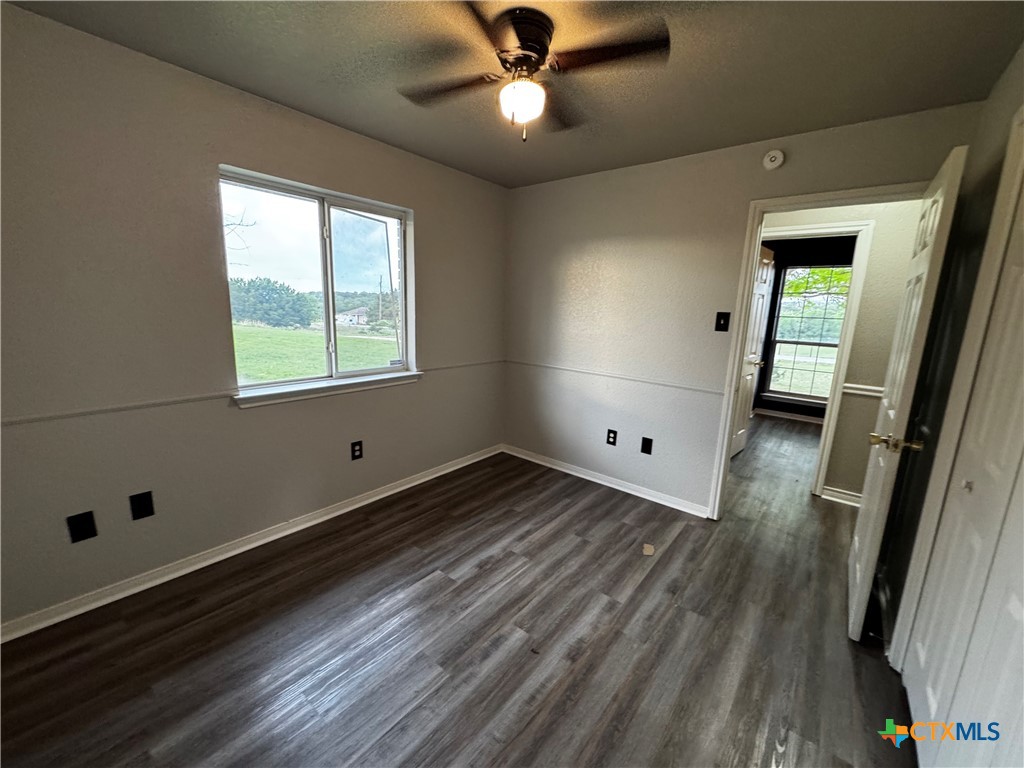 397 County Road 3367 Kempner, TX 76539 - Photo 30 of 47 wooden floor in an empty room with a window
