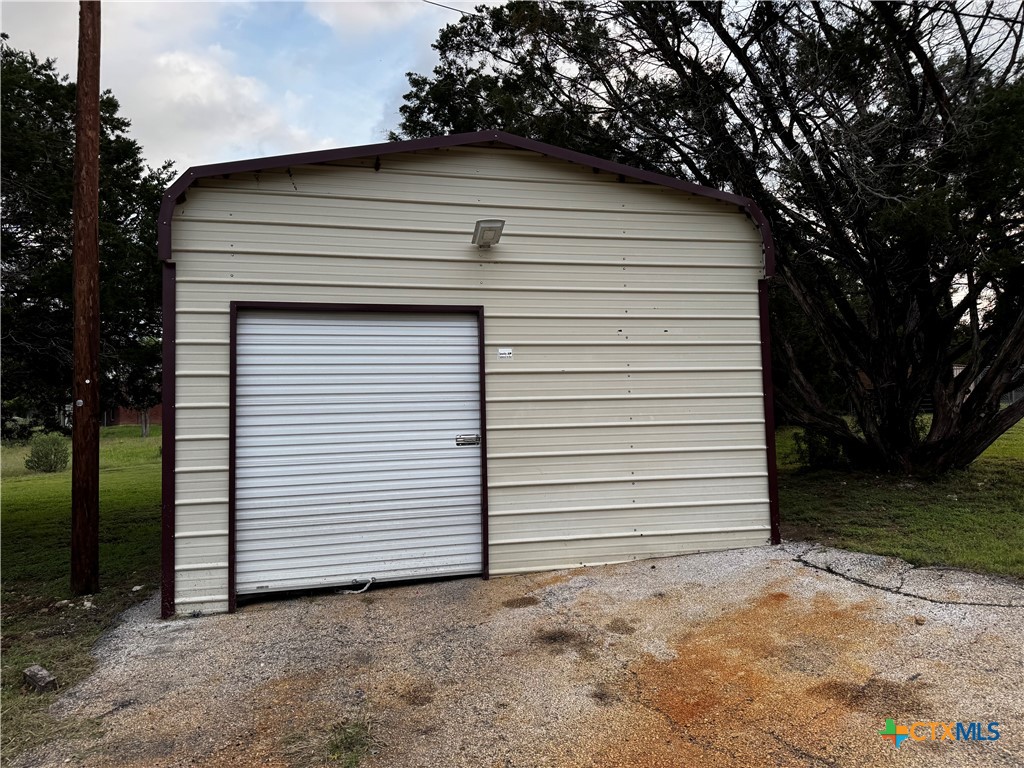 397 County Road 3367 Kempner, TX 76539 - Photo 4 of 47 a view of a white house with a small yard