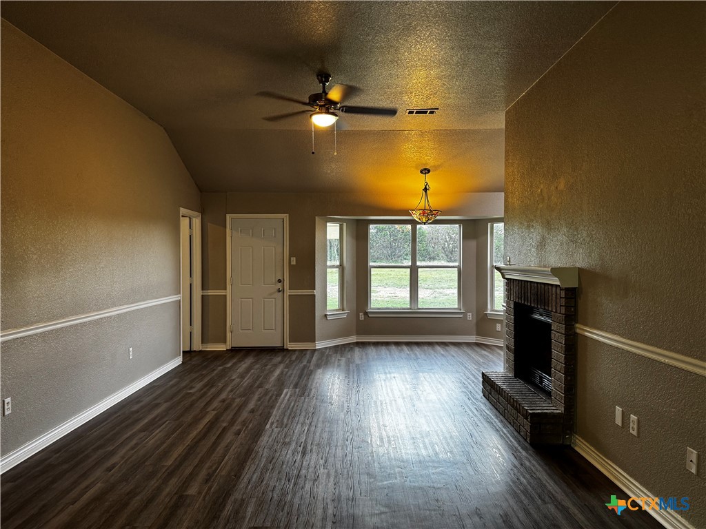397 County Road 3367 Kempner, TX 76539 - Photo 5 of 47 wooden floor in an empty room with a window