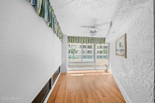 a view of livingroom with wooden floor