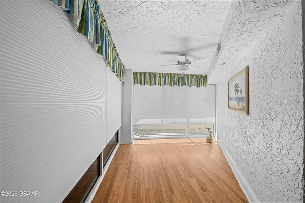 a view of entryway with wooden floor