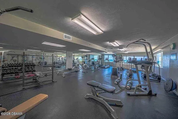 a view of a room with gym equipment