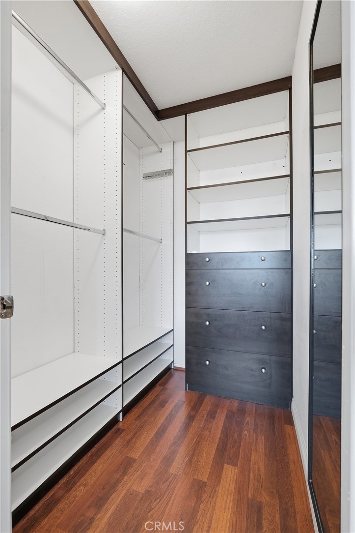 54 Oval Road Irvine, CA 92604 - Photo 19 of 28 Walk-in closet in primary bedroom