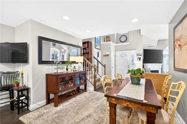 a view of kitchen with furniture and flat screen tv
