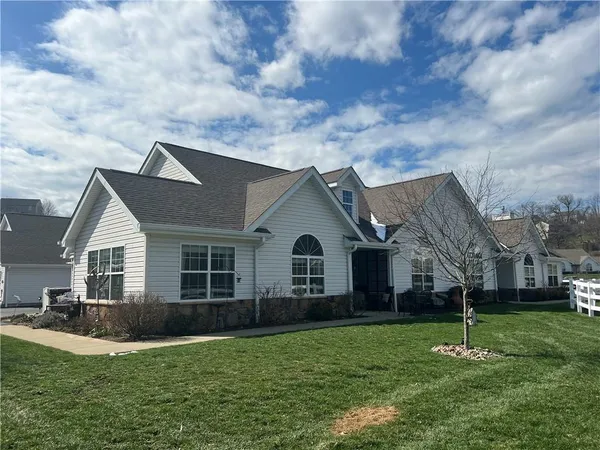 a house view with a garden space