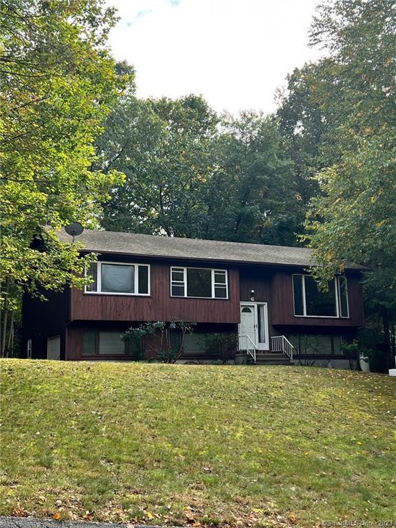 6 Webster Road East Lyme, CT 06333 - Photo 1 of 1 a front view of a house with a yard