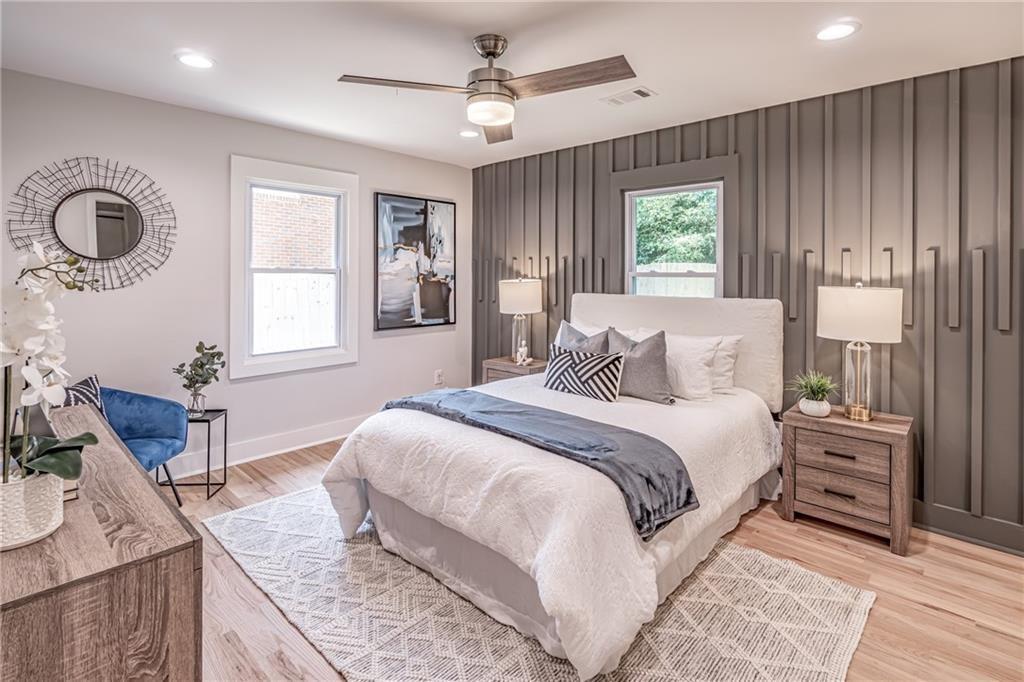 605 Blake Avenue Southeast Atlanta, GA 30316 - Photo 12 of 25 a spacious bedroom with a large bed and a window