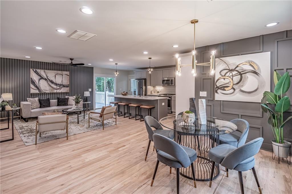 605 Blake Avenue Southeast Atlanta, GA 30316 - Photo 2 of 25 a dining room with furniture and wooden floor