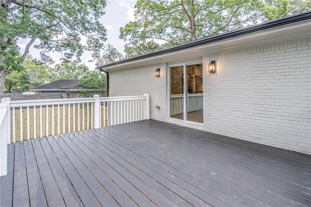 605 Blake Avenue Southeast Atlanta, GA 30316 - Photo 23 of 25 a view of backyard with deck and wooden floor