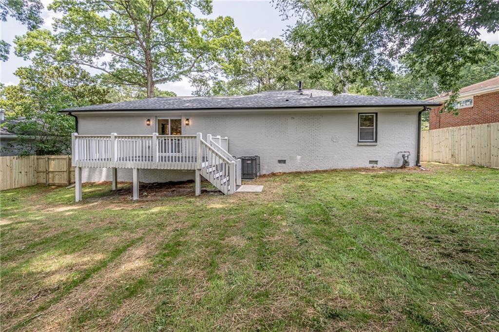 605 Blake Avenue Southeast Atlanta, GA 30316 - Photo 24 of 25 a backyard of a house with table and chairs