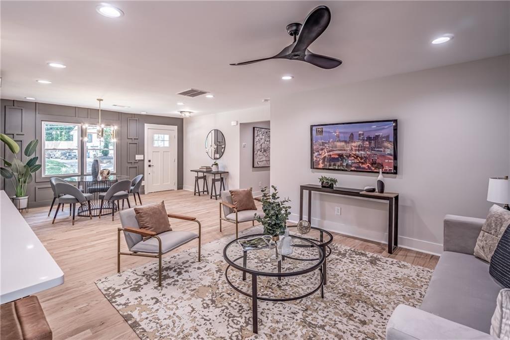 605 Blake Avenue Southeast Atlanta, GA 30316 - Photo 10 of 25 a living room with furniture and a rug