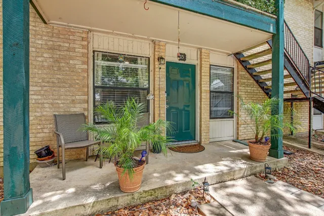 a view of a entryway door front of house
