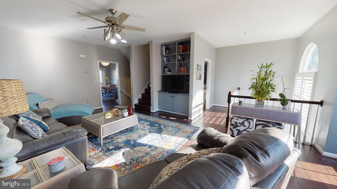 8709 Riverscape Court Odenton, MD 21113 - Photo 11 of 65 Living room with built in shelving