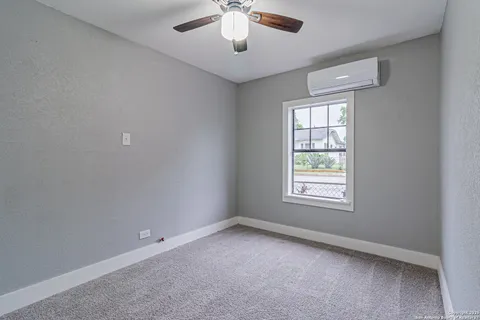 a view of a bathroom from the hallway
