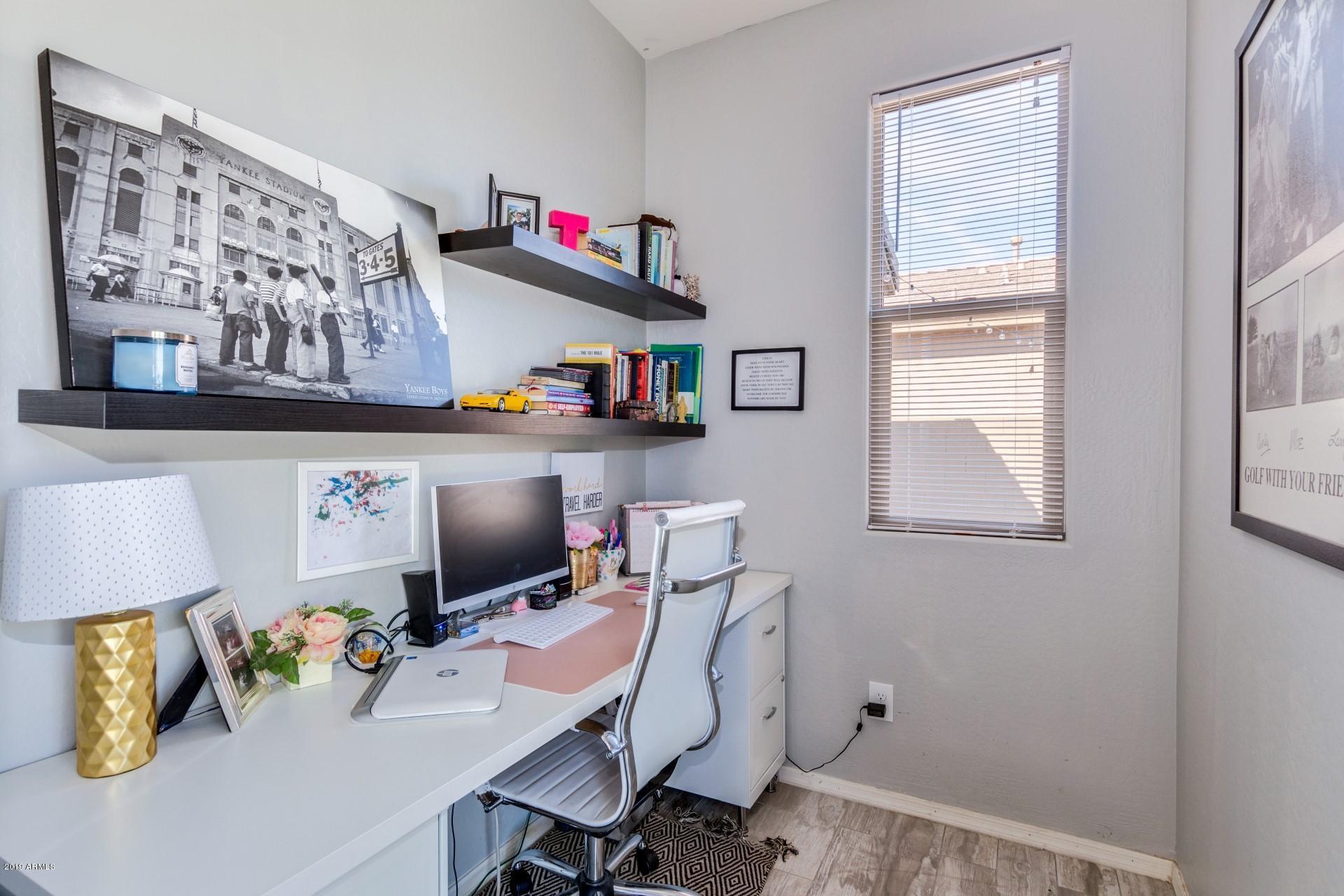 7726 West Shumway Farm Road Laveen, AZ 85339 - Photo 14 of 27 a view of workspace with toys