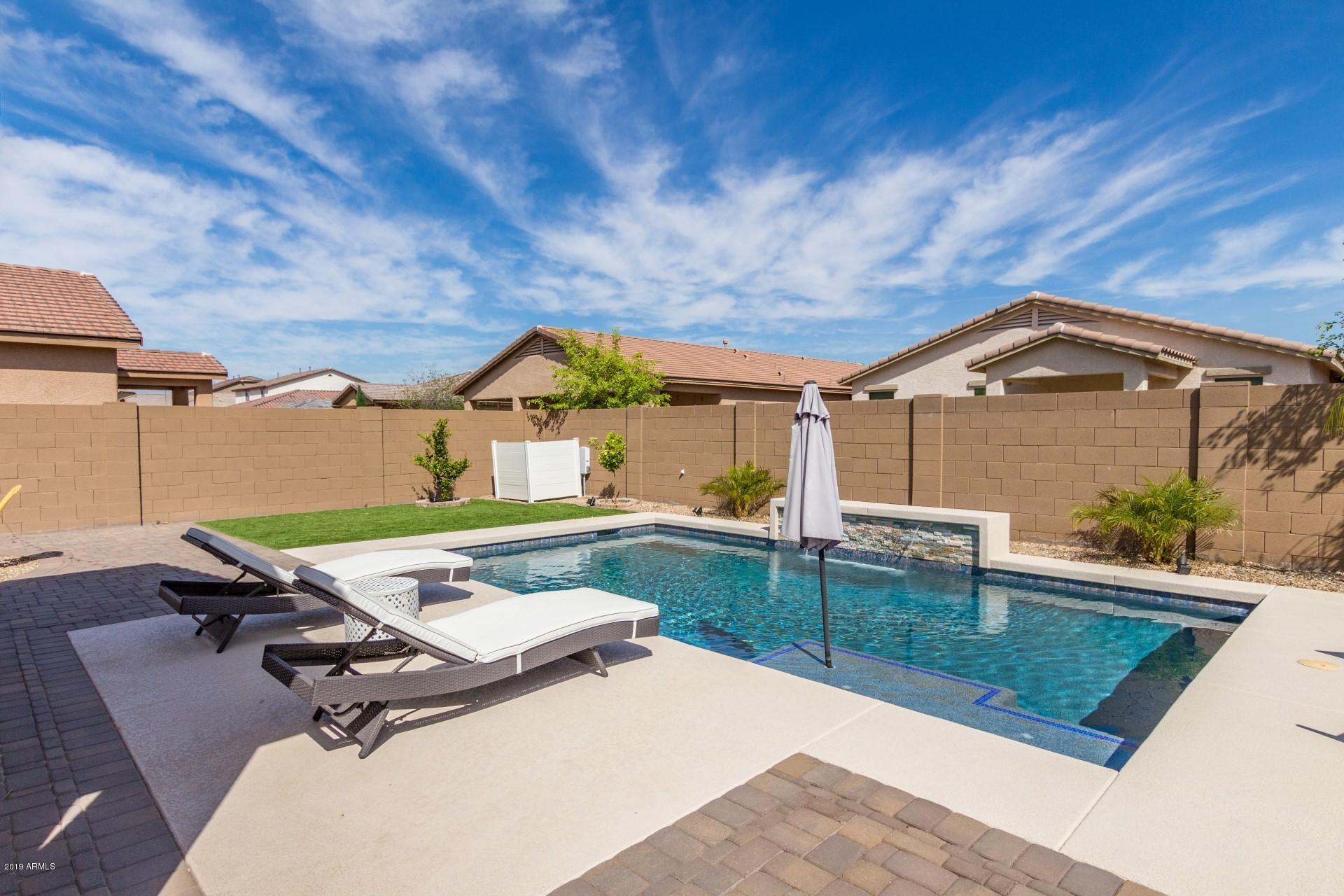 7726 West Shumway Farm Road Laveen, AZ 85339 - Photo 21 of 27 a view of a patio with a yard