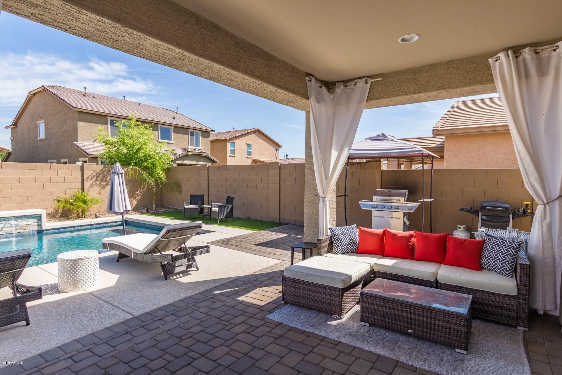7726 West Shumway Farm Road Laveen, AZ 85339 - Photo 22 of 27 a outdoor space with patio furniture