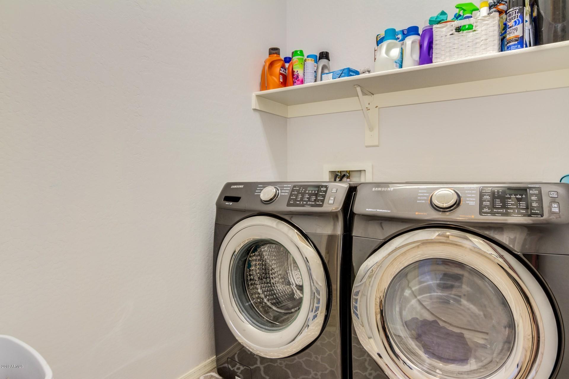 7726 West Shumway Farm Road Laveen, AZ 85339 - Photo 26 of 27 a utility room with dryer and washer