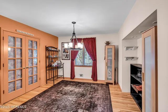 a view of a hallway with windows