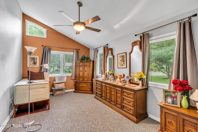 a room with furniture and a window