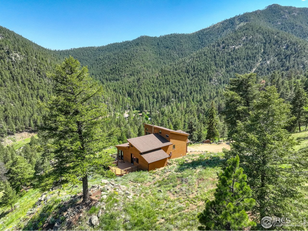 192 Nugget Hill Road Jamestown, CO 80455 - Photo 24 of 25 Side aerial view of property and surrounding mountains