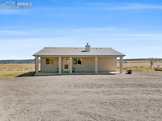 a aerial view of residential houses with outdoor space