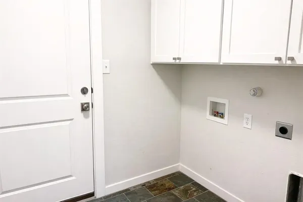 a bathroom with a sink and a window