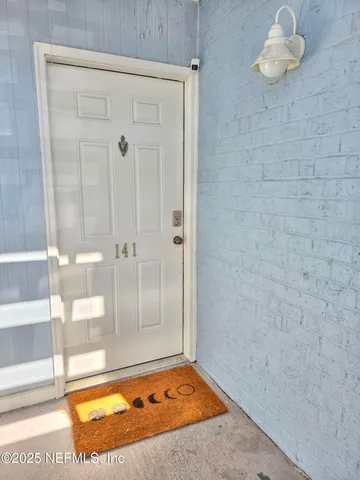 a bathroom with a tub and shower