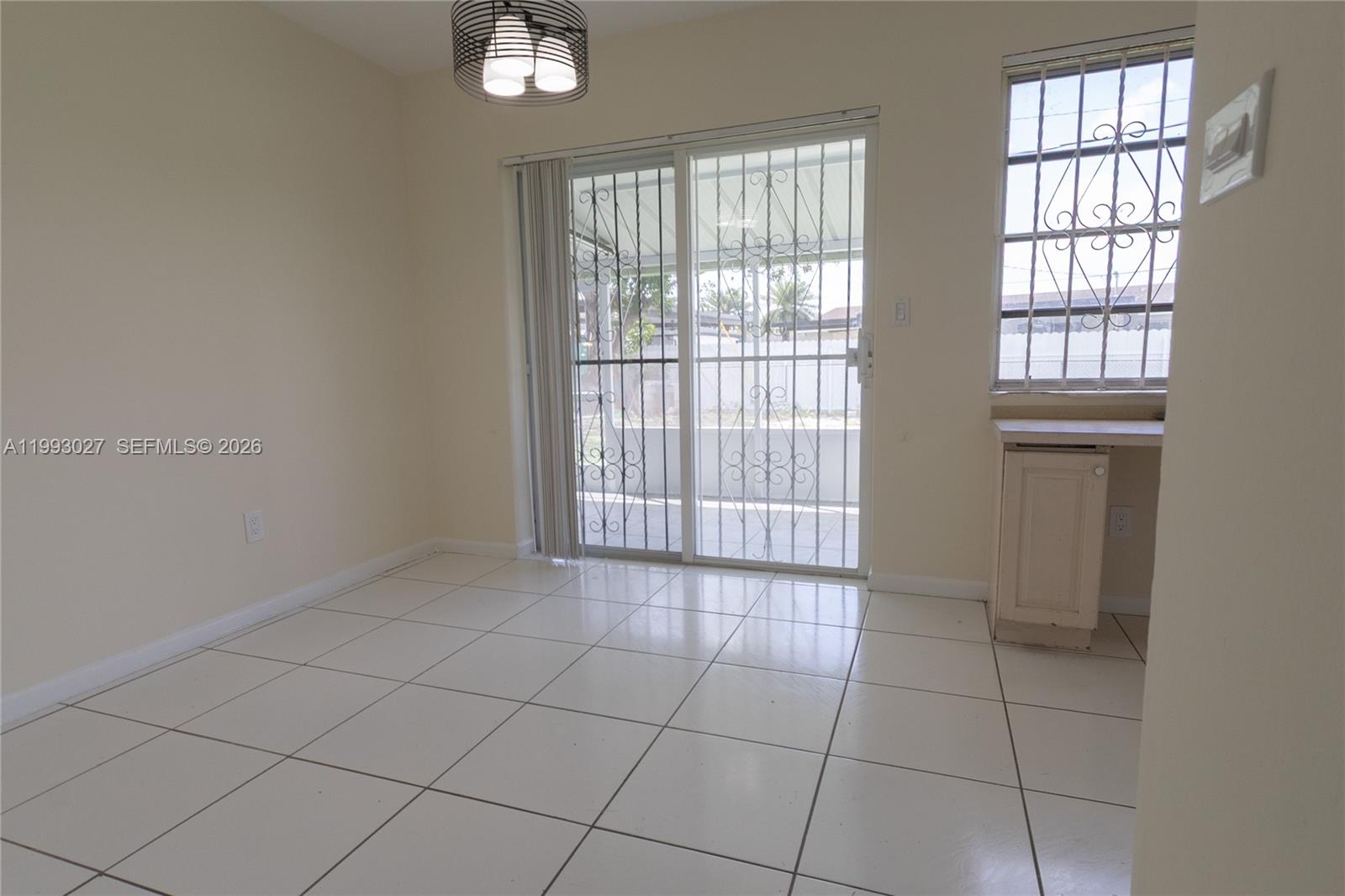 11770 Southwest 168th Street, Unit 11770 Miami, FL 33177 - Photo 15 of 22 a view of an empty room with a window
